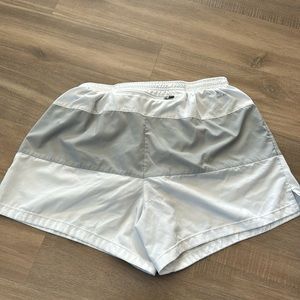 Men’s large Nike Dri-Fit running shorts gray and white.